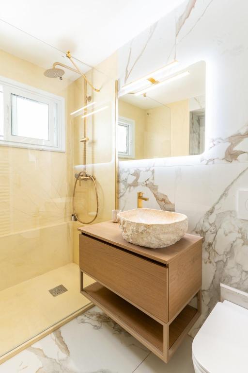 Vannituba majutusasutuses Syros DouBleTS Apartments
