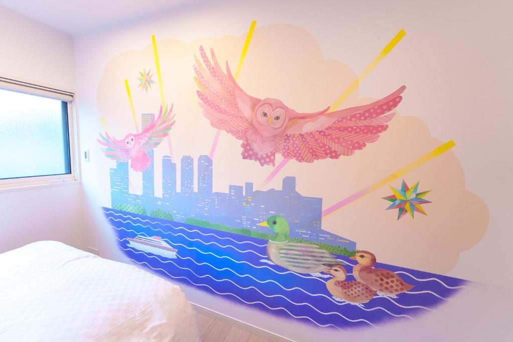 Postel nebo postele na pokoji v ubytování Luce Stay&Resort Evoluto101