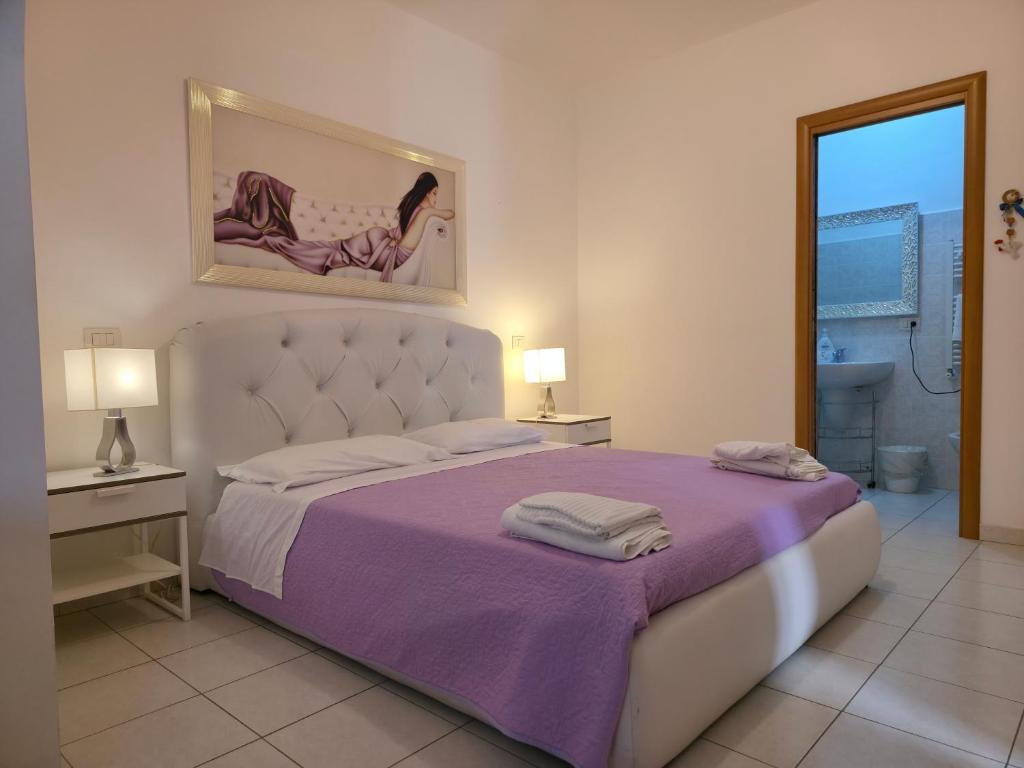 Postel nebo postele na pokoji v ubytování Bella Matera