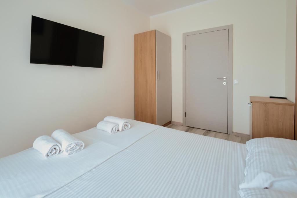 Postel nebo postele na pokoji v ubytování Luxury Apartments Vili