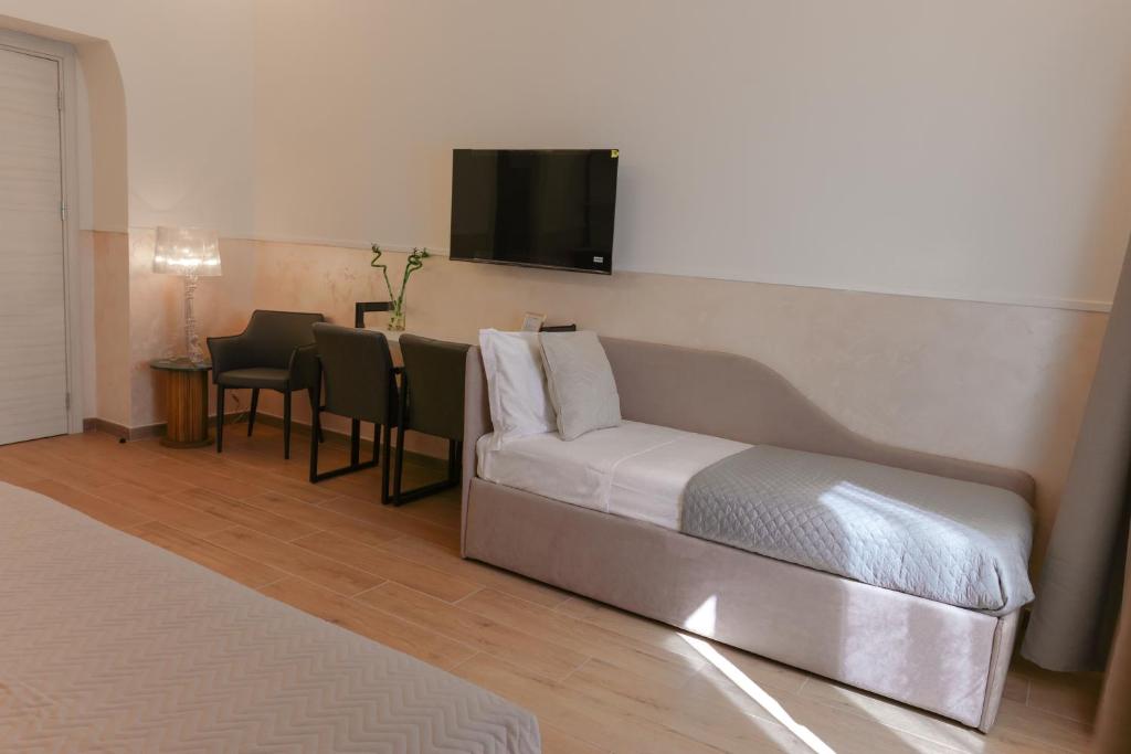 Llit o llits en una habitació de B&B Smart Rooms