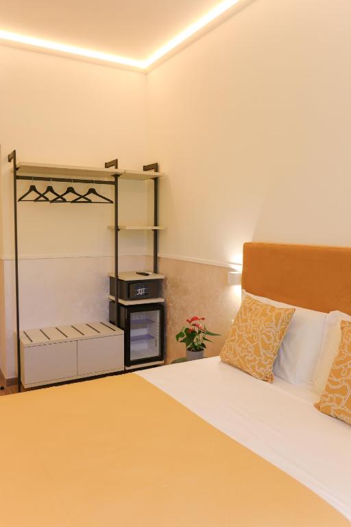 Llit o llits en una habitació de B&B Smart Rooms