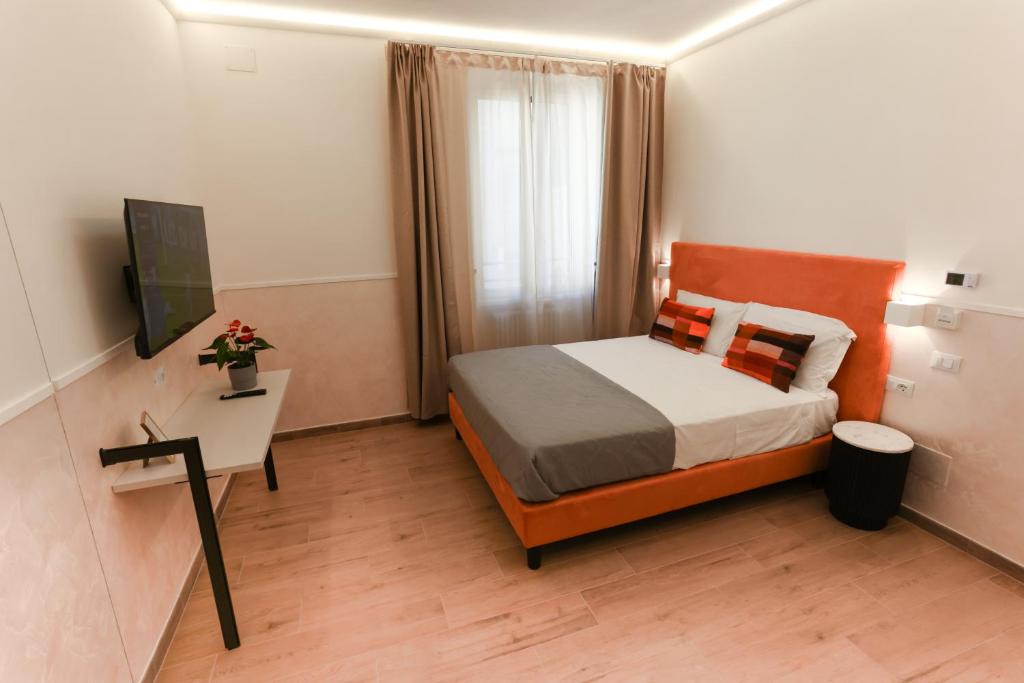 Llit o llits en una habitació de B&B Smart Rooms