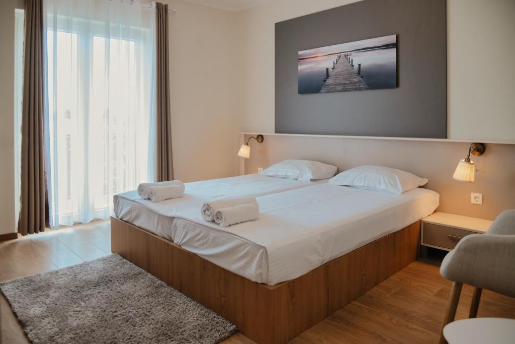 Postel nebo postele na pokoji v ubytování Luxury Apartments Vili