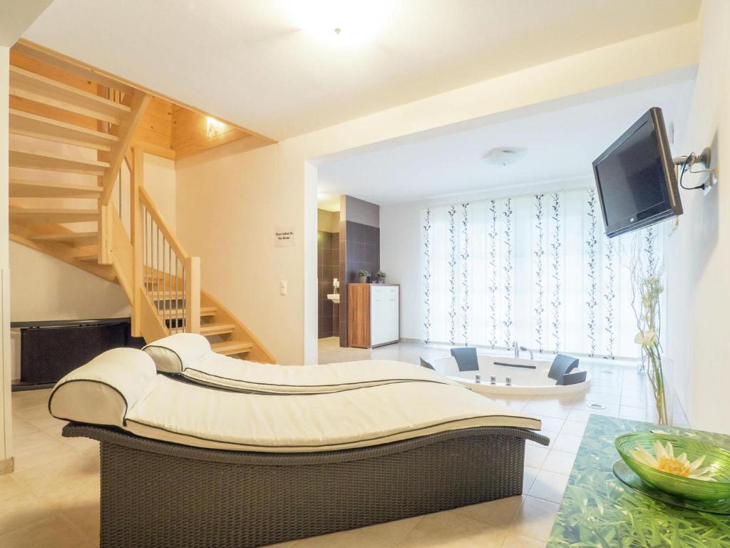 Televízia a/alebo spoločenská miestnosť v ubytovaní Chalet Bergoase