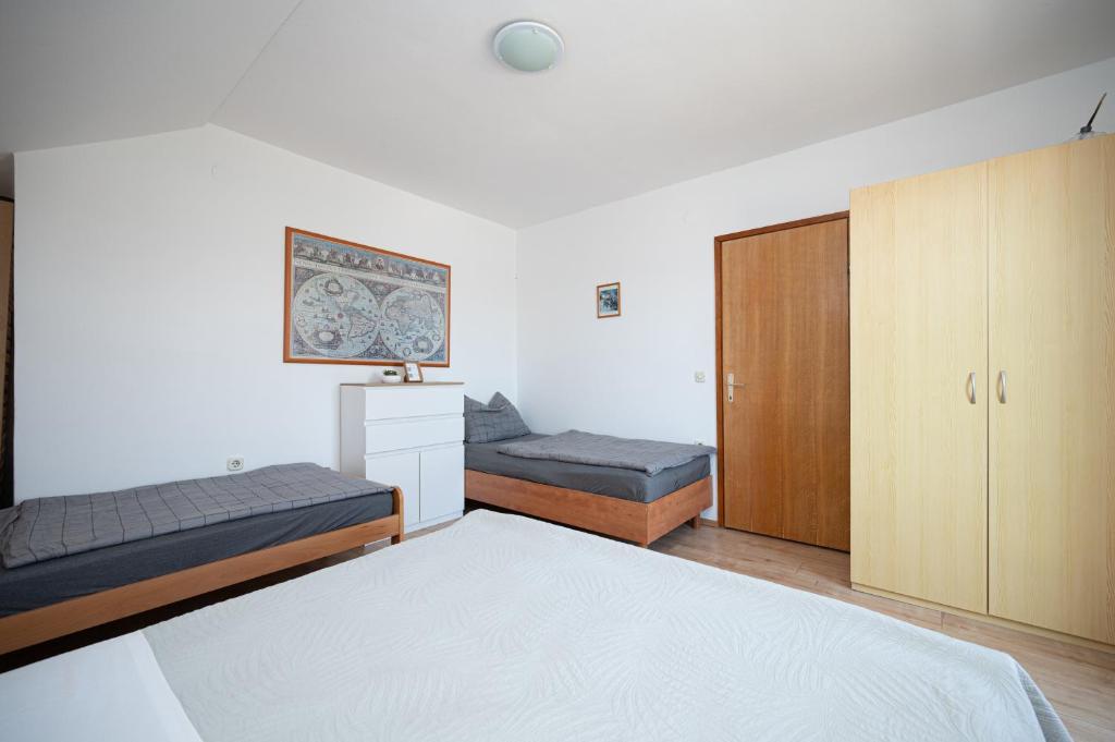Posteľ alebo postele v izbe v ubytovaní Apartment Vrsi - Mulo 3276a
