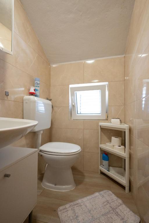 Kúpeľňa v ubytovaní Apartment Vrsi - Mulo 3276a