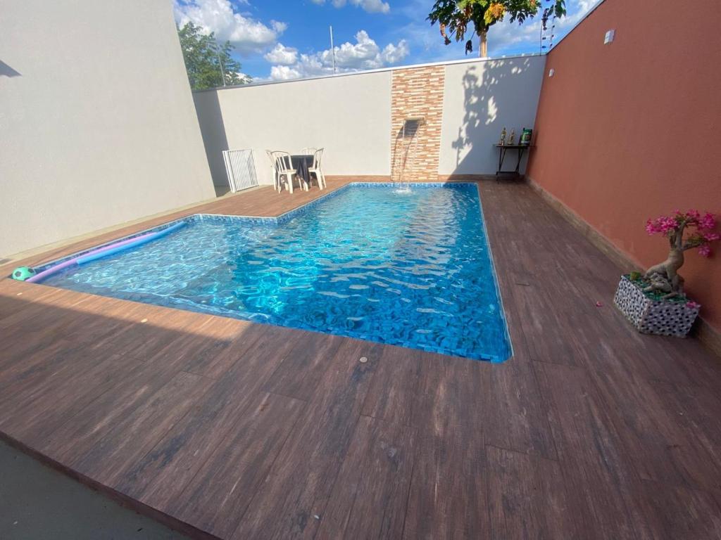 Πισίνα στο ή κοντά στο Casa com piscina 2 quartos em Luzimangues Porto Nacional casa de temporada Summer House