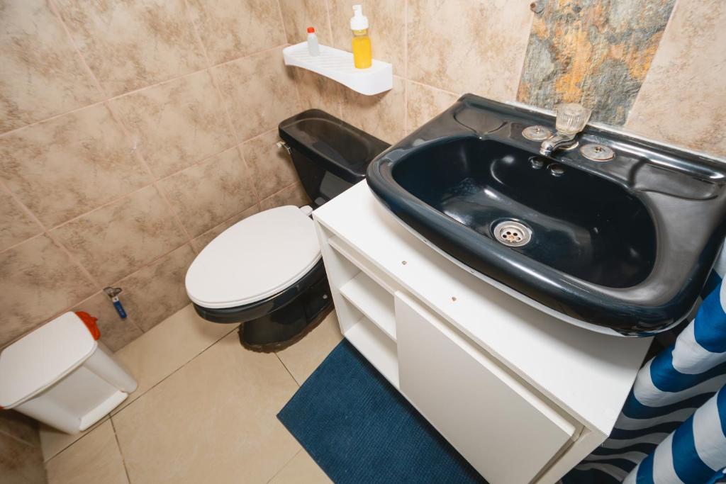 Koupelna v ubytování Hotel Casa Latina