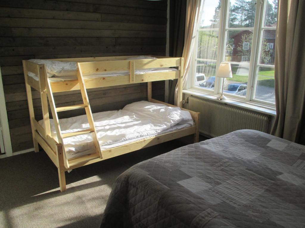 Postel nebo postele na pokoji v ubytování Vilan I Orbaden