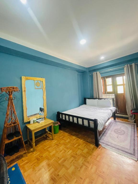 Postel nebo postele na pokoji v ubytování Pasne Aajako Hotel