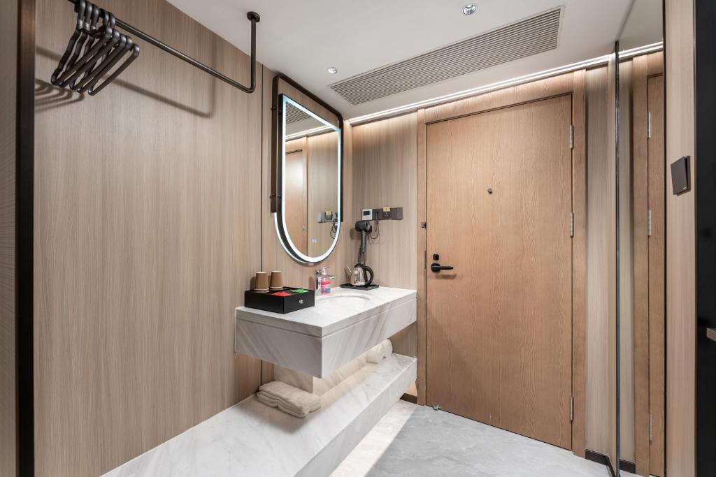Koupelna v ubytování Guangzhou JinTang Hotel