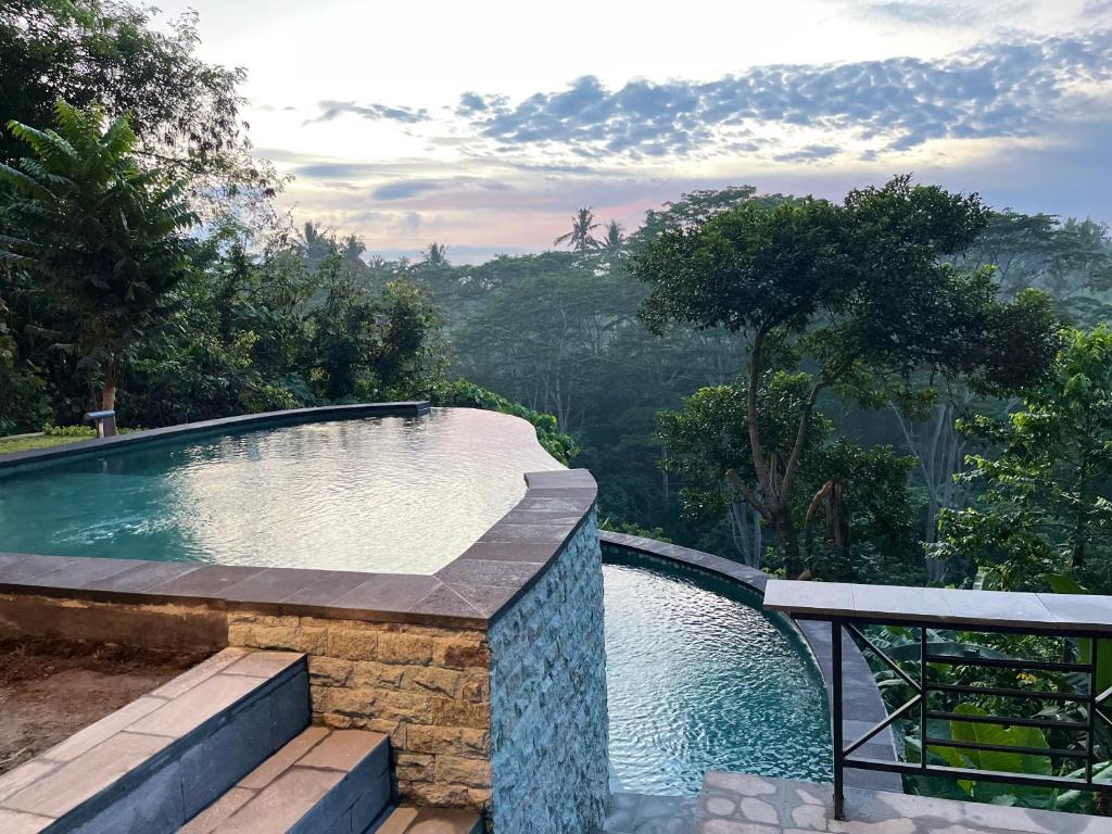 Bazén v ubytování D'Nanda mini hotel Ubud nebo v jeho okolí