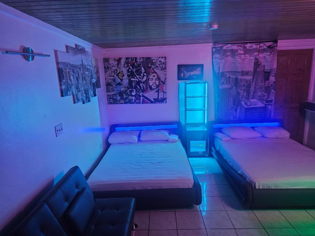 Postel nebo postele na pokoji v ubytování Big Apple Hotel