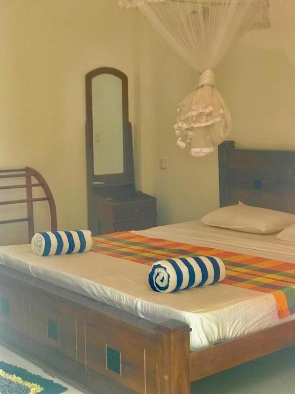 Postel nebo postele na pokoji v ubytování Sea Zone Resort