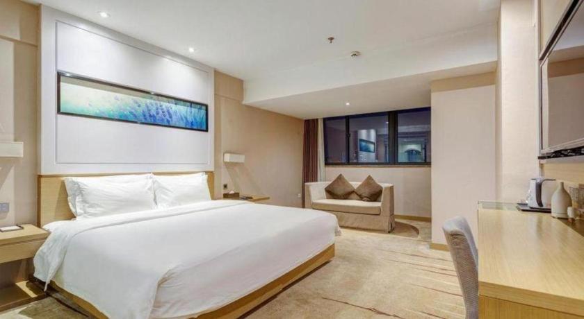 Ένα ή περισσότερα κρεβάτια σε δωμάτιο στο Lavande Hotel Xian Gaoxin Branch