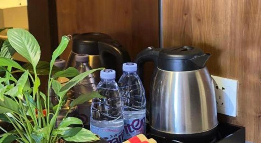 Příslušenství pro přípravu čaje a kávy v ubytování Oriental Hotel