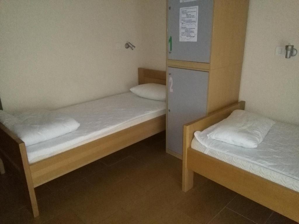 Postel nebo postele na pokoji v ubytování HI Hostel Rijeka