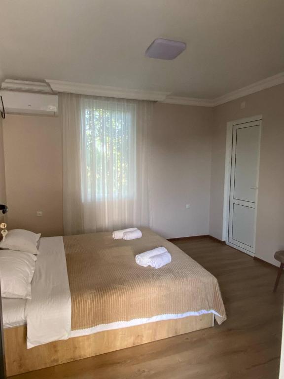 Postel nebo postele na pokoji v ubytování Hotel Doko