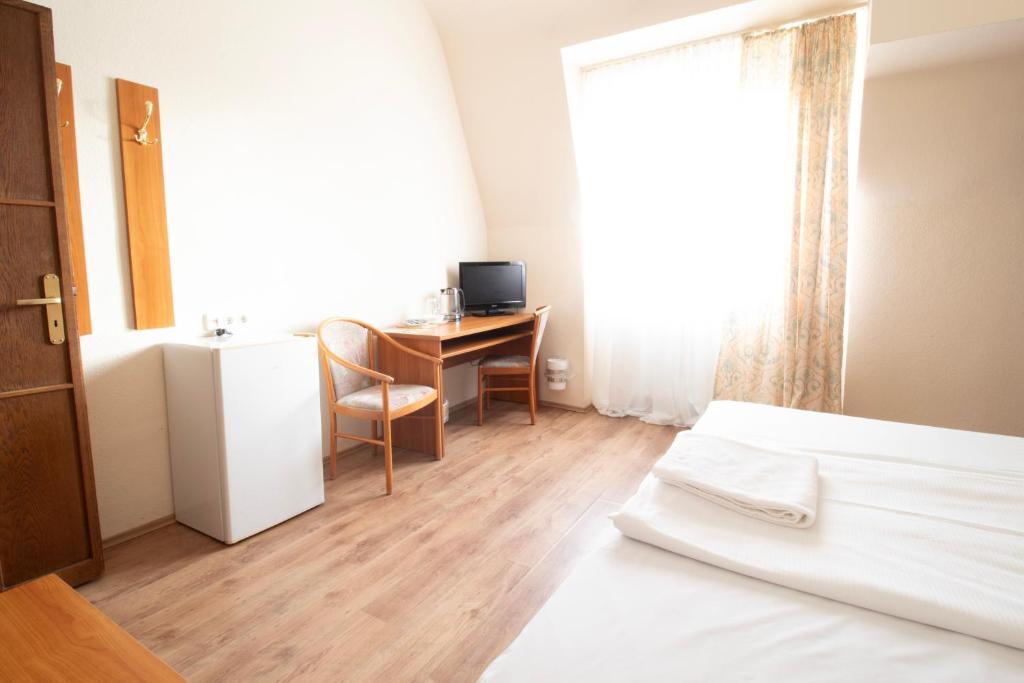 Cama ou camas em um quarto em Villa ENTO HotelWestEnd