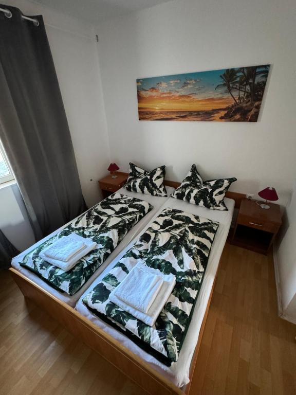Posteľ alebo postele v izbe v ubytovaní Apartman Viki