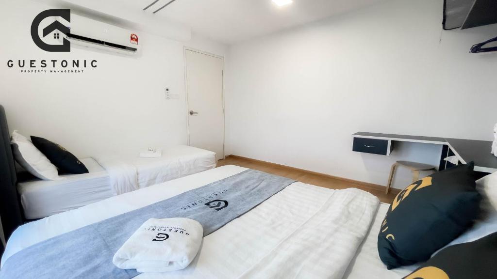 Postel nebo postele na pokoji v ubytování EkoCheras Cozy Suite by GUESTONIC