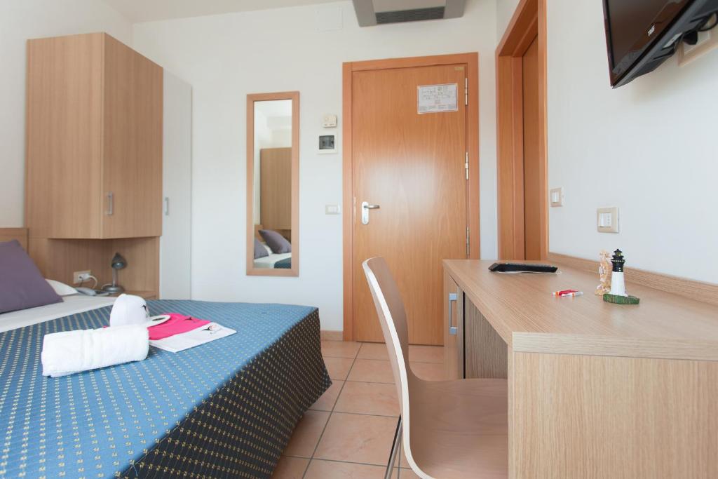 Postel nebo postele na pokoji v ubytování Hotel Souvenir - Koolibry Hotels
