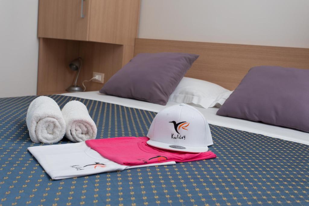 Postel nebo postele na pokoji v ubytování Hotel Souvenir - Koolibry Hotels