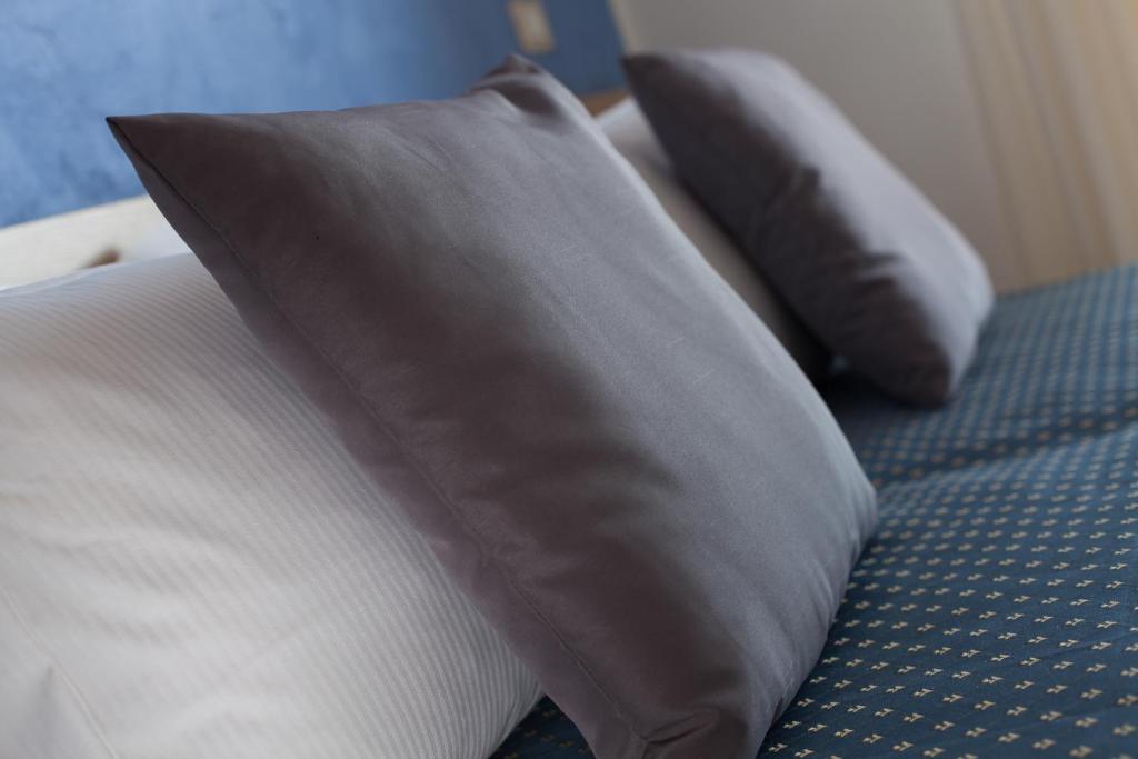 Postel nebo postele na pokoji v ubytování Hotel Souvenir - Koolibry Hotels
