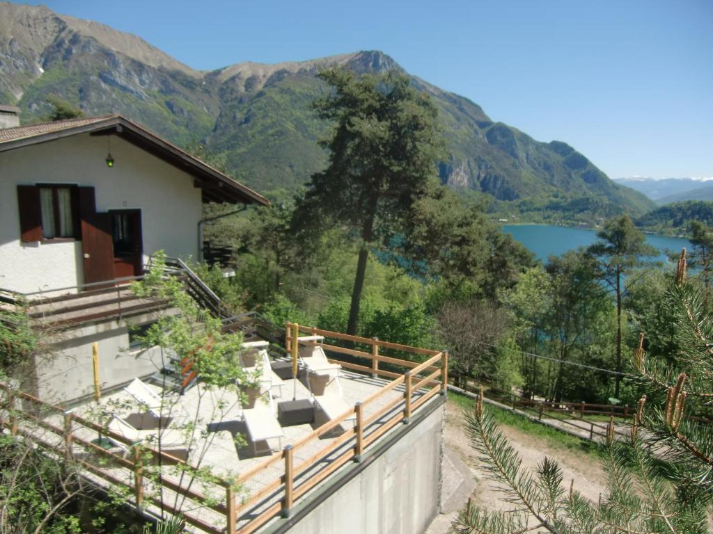 a house with a view of a lake and mountains at Casa Ambra in Ledro