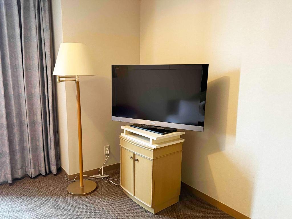 TV a/nebo společenská místnost v ubytování Ginza Creston