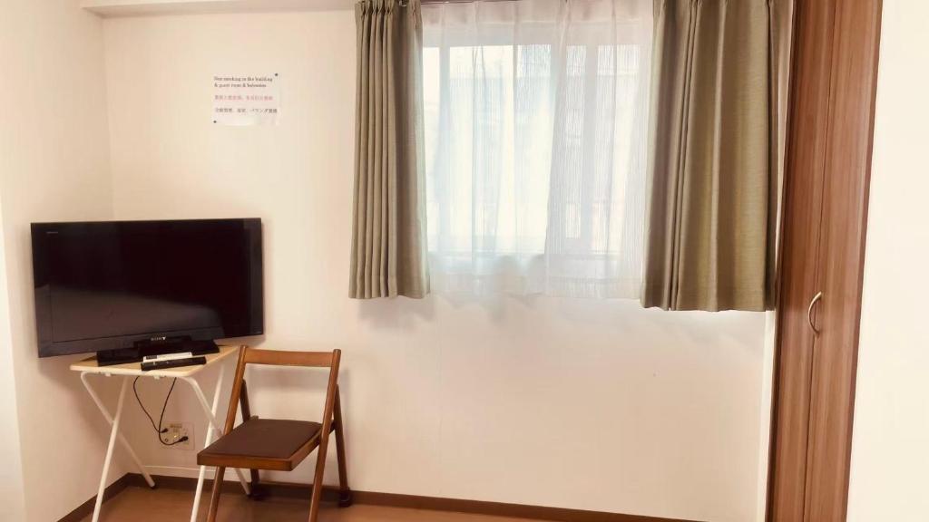 TV a/nebo společenská místnost v ubytování SkyHotel Ryogoku 駅徒歩4分