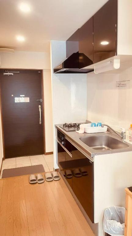 Kuchyň nebo kuchyňský kout v ubytování SkyHotel Ryogoku 駅徒歩4分