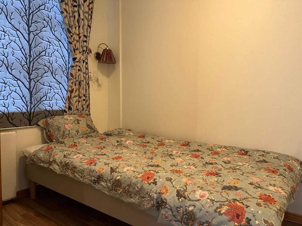 Postel nebo postele na pokoji v ubytování Kvistrom Inn - Kviströms Gästgiveri