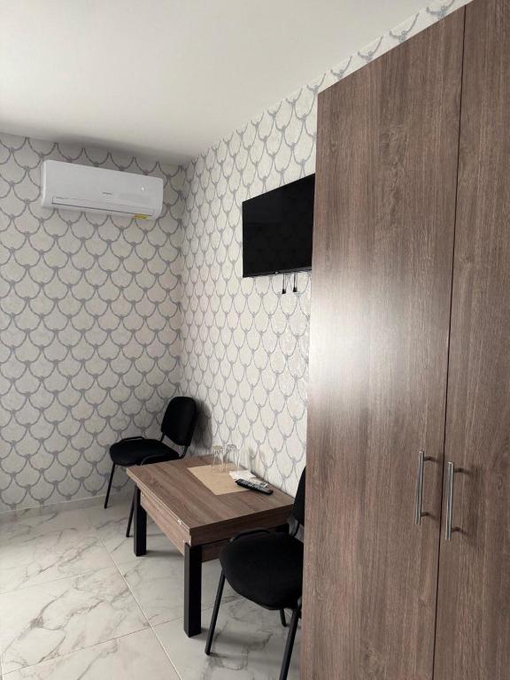 TV a/nebo společenská místnost v ubytování Hotel ELYSIUM