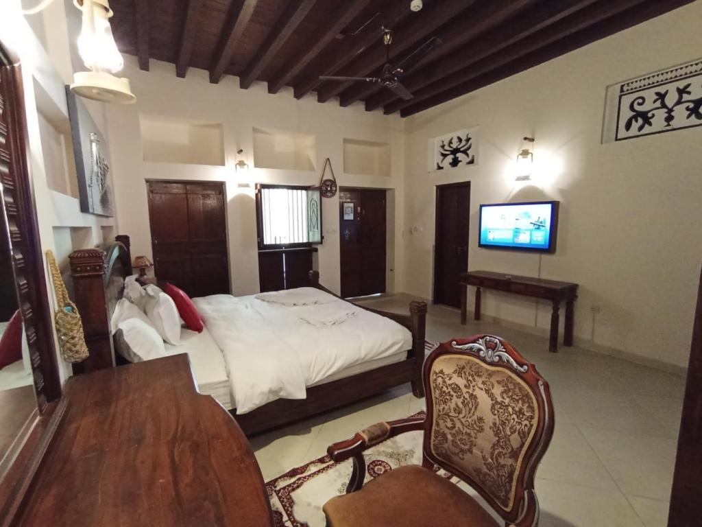Postel nebo postele na pokoji v ubytování Hyba Heritage Guest House
