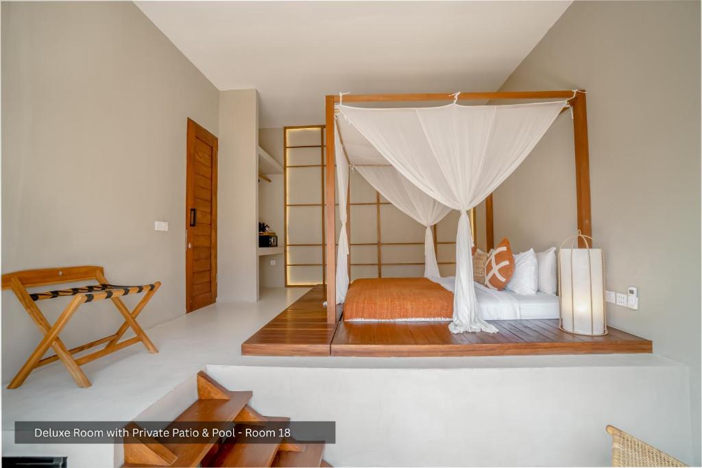 Postel nebo postele na pokoji v ubytování IKIGAI Uluwatu Beach