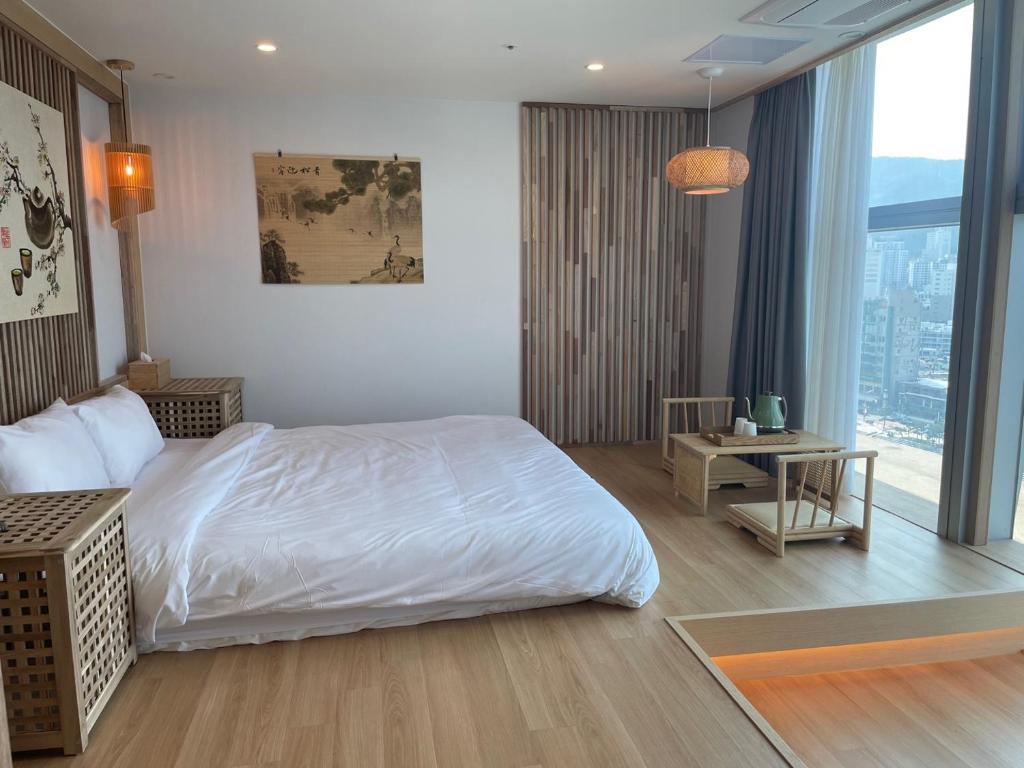 Postel nebo postele na pokoji v ubytování Hotel Badada