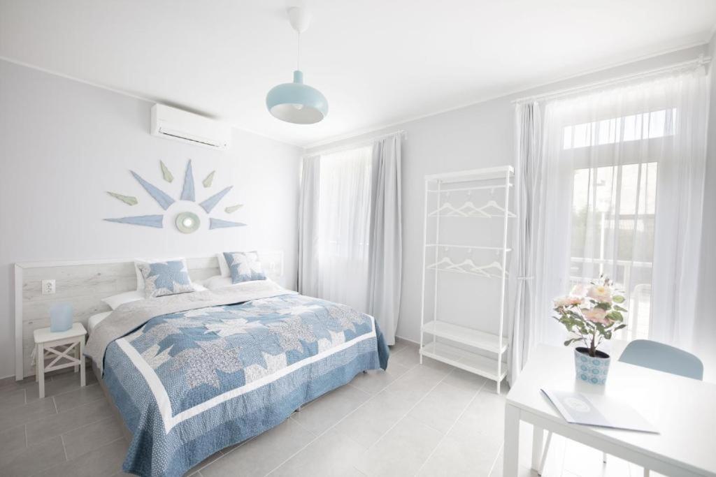 Posteľ alebo postele v izbe v ubytovaní TópART Apartman I