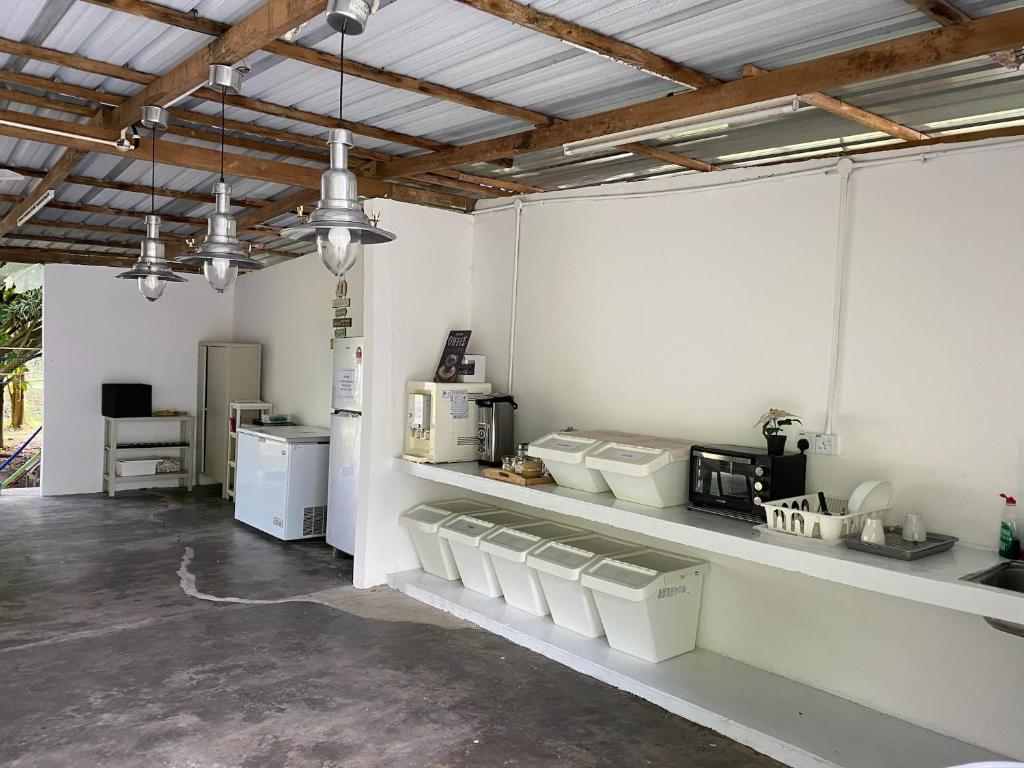 Kuchyň nebo kuchyňský kout v ubytování Canopy Villa Glamping Park