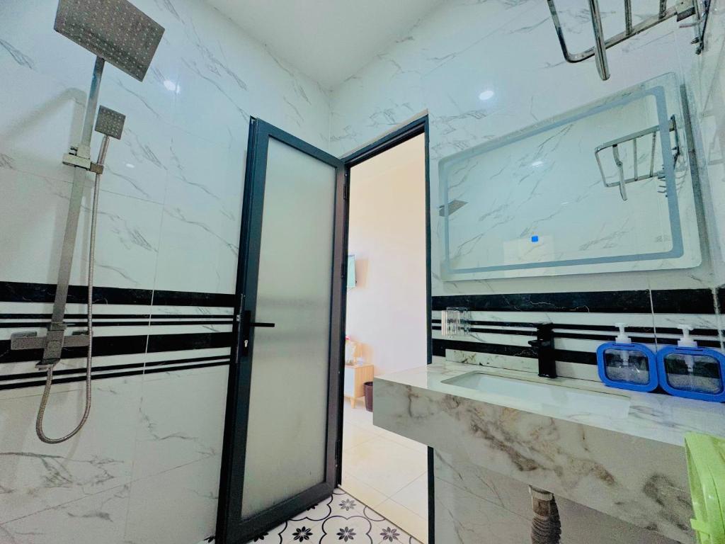Koupelna v ubytování Mila Homestay Grand World Phú Quốc