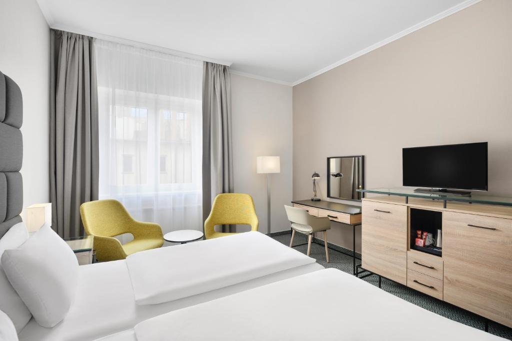 Televiisor ja/või meelelahutuskeskus majutusasutuses Danubius Hotel Raba