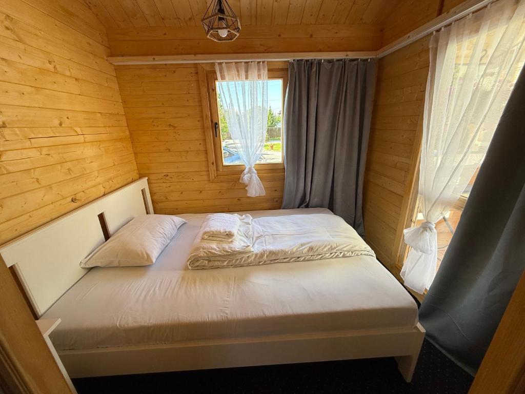 Postel nebo postele na pokoji v ubytování Noclegi AirportPark