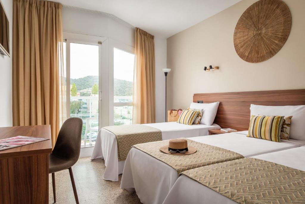 Postel nebo postele na pokoji v ubytování Hotel Cartago Nova by ALEGRIA