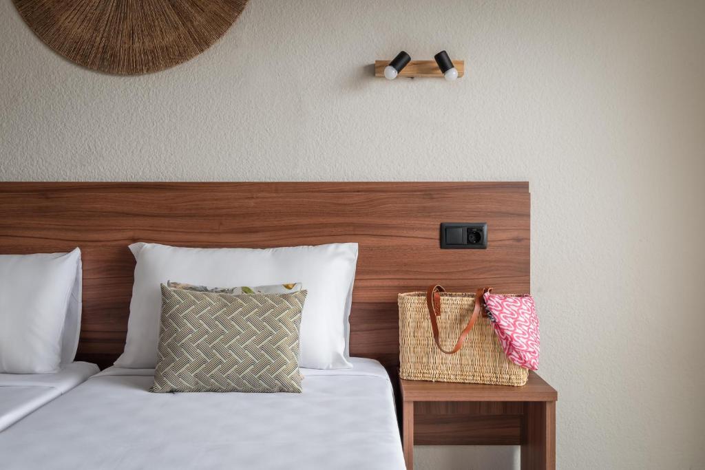 Postel nebo postele na pokoji v ubytování Hotel Cartago Nova by ALEGRIA