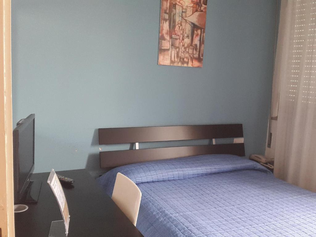 Postel nebo postele na pokoji v ubytování Cavalieri del Tau