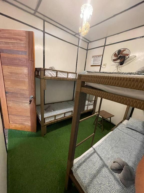 Postel nebo postele na pokoji v ubytování Ecostay Panglao Resort Hotel