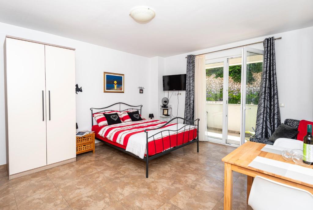 Postel nebo postele na pokoji v ubytování Apartments Veronika