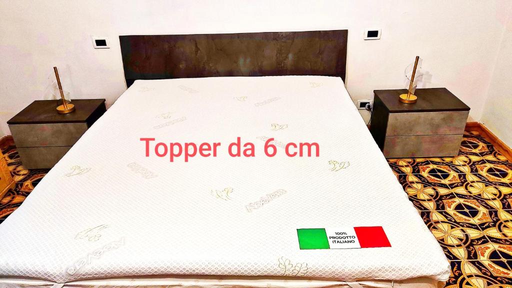 Postel nebo postele na pokoji v ubytování Domus Aura
