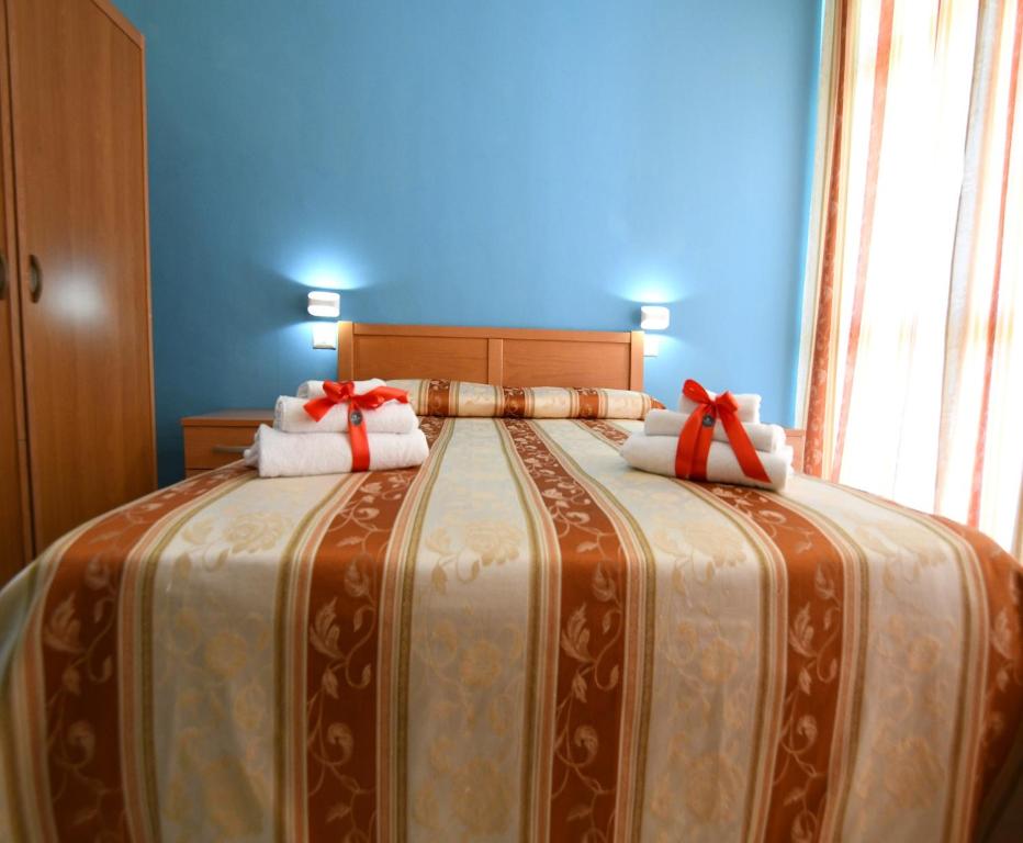 Postel nebo postele na pokoji v ubytování International Resort